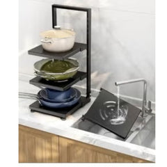 Huitich adjustable pot rack organizer in black metal holding pots and pans on kitchen countertop