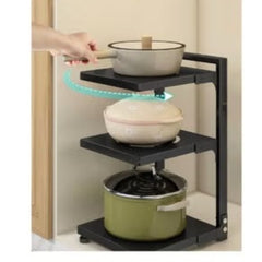 Huitich black adjustable pot rack organizer with three rotating shelves holding pots in kitchen
