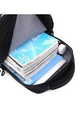Kids school backpack interior showing books in padded zip pocket with blue trim