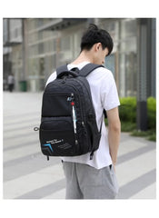 Huitich black and blue 6-wheel school bag backpack worn by boy outdoors with multiple compartments