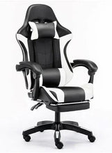 Ergonomic gaming office chair with black upholstery, white side panels, and curved headrest