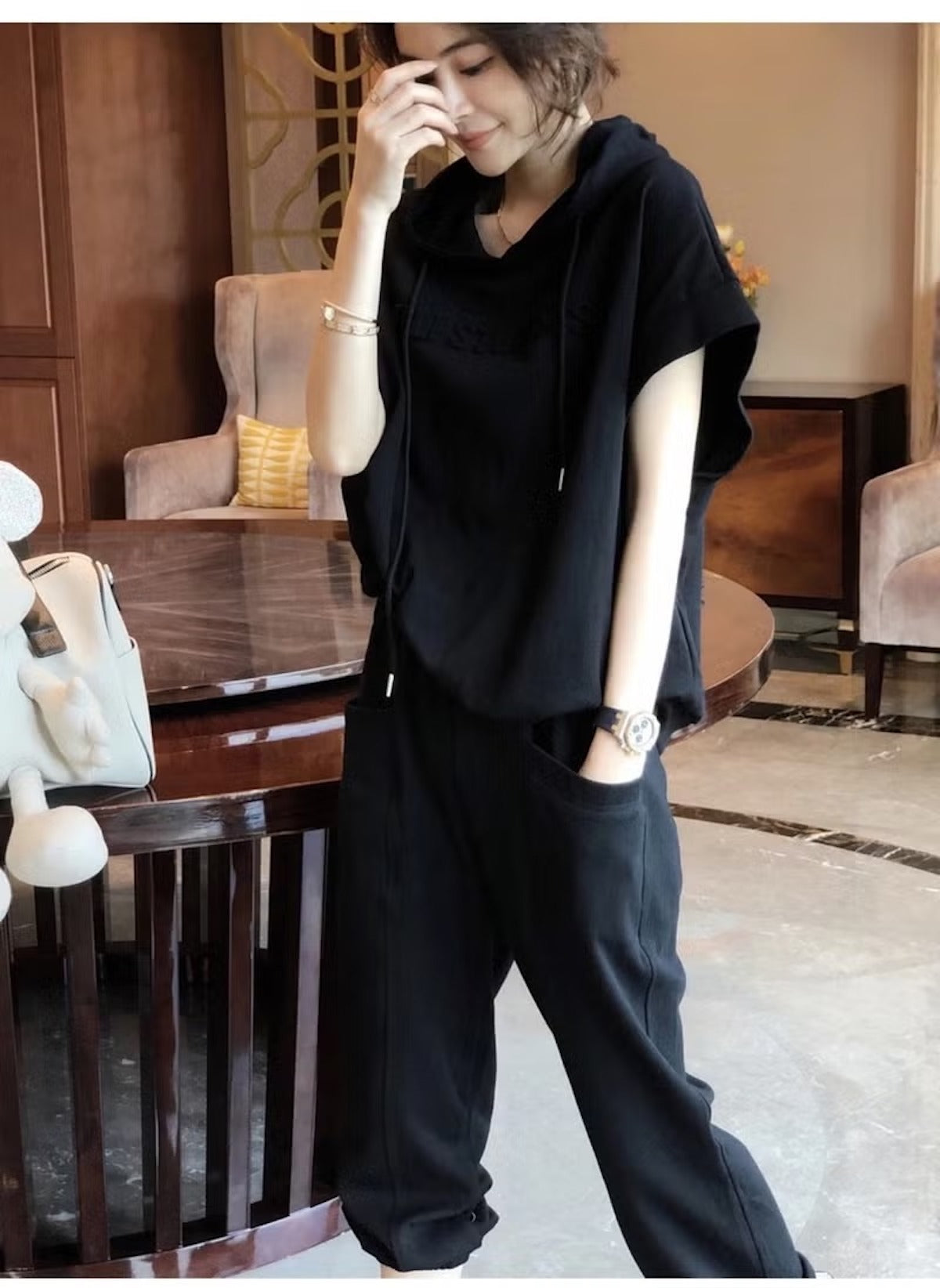 Huitich black and grey lounge set UAE women clothing featuring a comfortable loose fit hooded top and matching pants