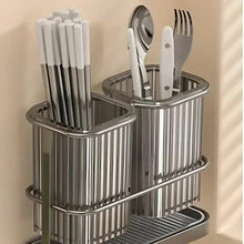 Stainless steel utensil caddy with chopstick holder, fork slots, and two cylinders