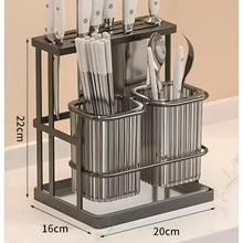 Stainless steel chopstick and knife holder on square base with three utensil cylinders