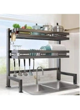 Black dish drying rack with two tiers, utensil hooks, and rectangular drip tray