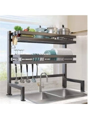 Huitich black dish drying rack with two-tier shelves and utensil hooks over kitchen sink