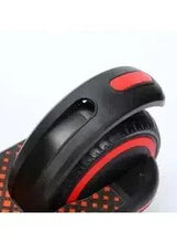 Front wheel and fender of black electric kick scooter with red accents