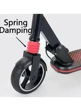 Spring-damping front fork and wheel of black kick scooter with red suspension