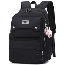 Black school backpack with front zip pockets, top handle, and padded shoulder straps.