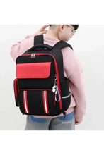 Kids six-wheel trolley school bag, black with red panels and shoulder straps.