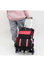 Kids six-wheel trolley school bag, black with red top flap and front stripes.