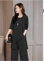 Woman wearing black three-piece slim suit for women with long jacket and wide-leg pants