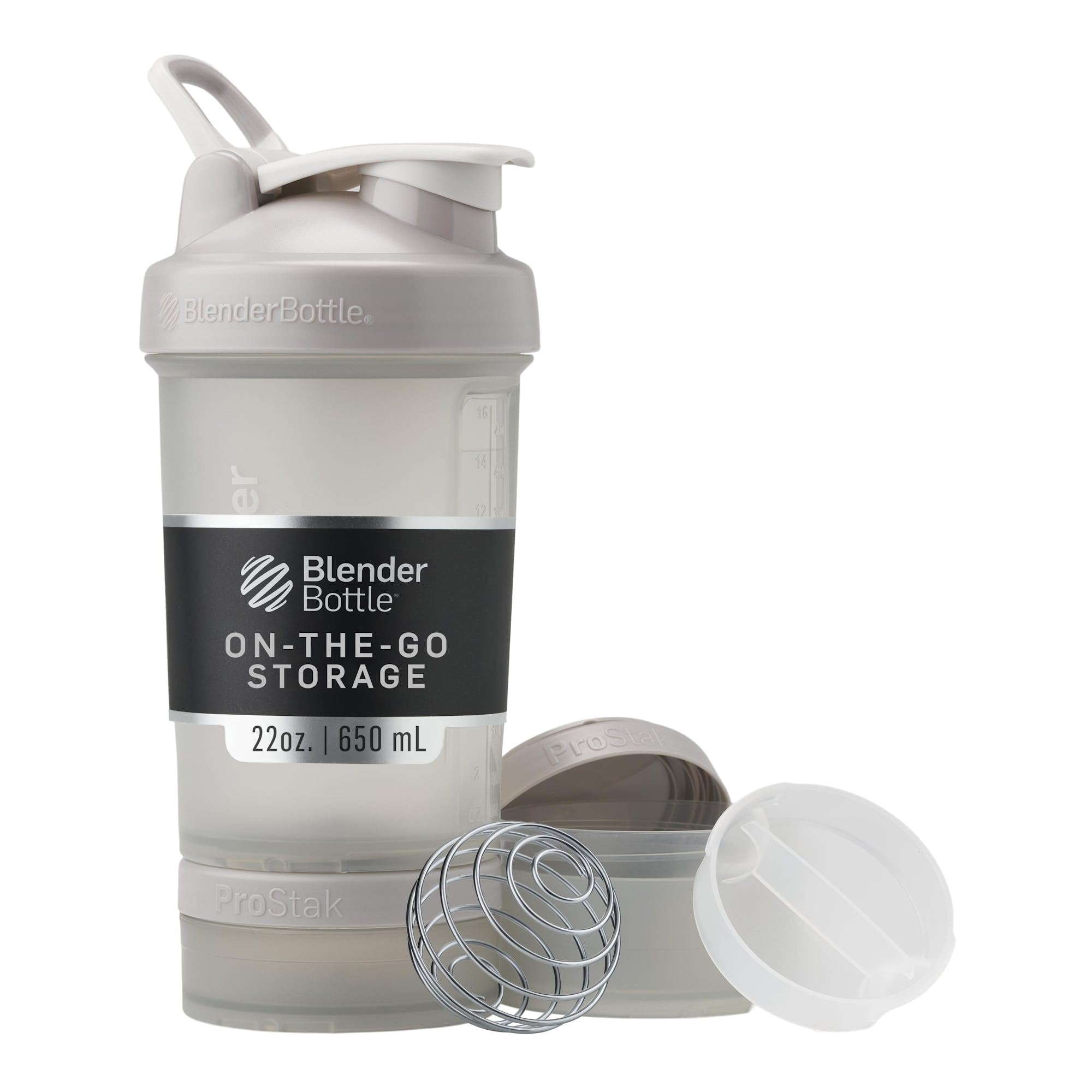 BlenderBottle shaker bottle with pill organizer in neutral gray 22oz on the go storage with whisk