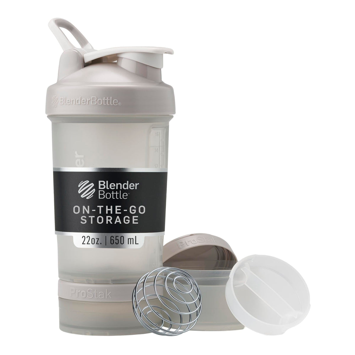 BlenderBottle shaker bottle with pill organizer in neutral gray 22oz on the go storage with whisk