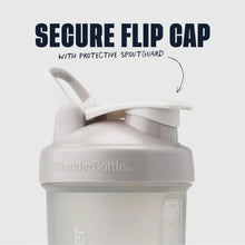 Smoke gray shaker bottle close-up showing flip cap and spout-guard detail