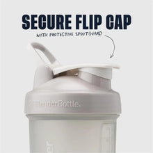 Smoke gray shaker bottle close-up of flip cap and storage lid