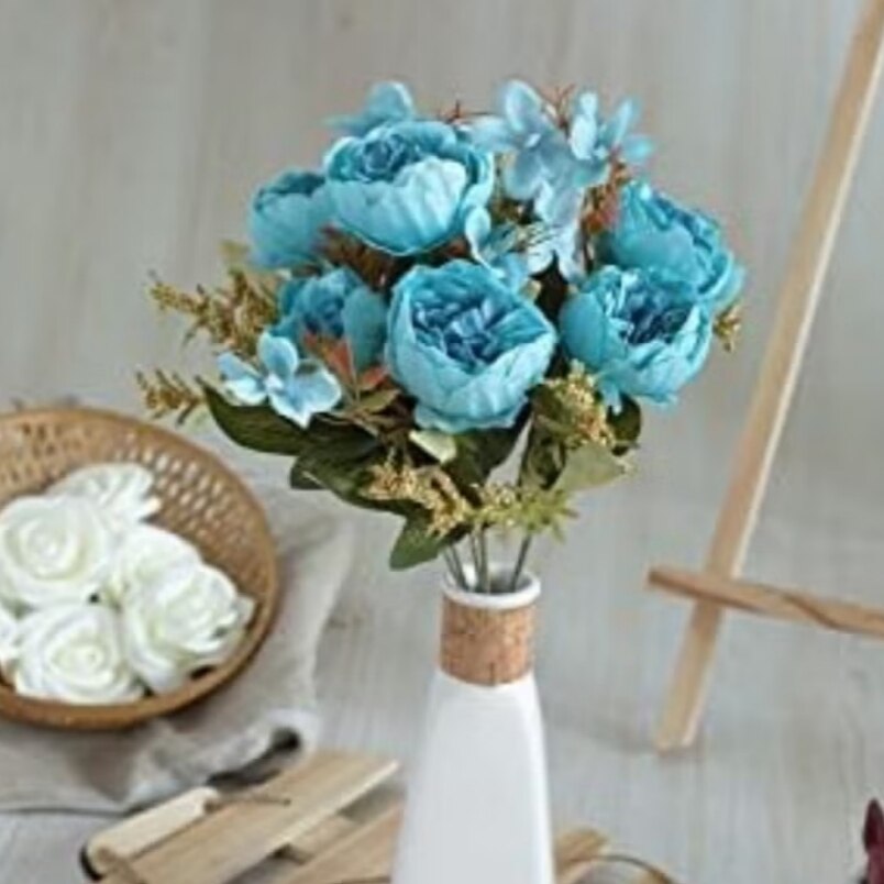 Huitich blue artificial flower bouquet in a white vase with green leaves and delicate petals