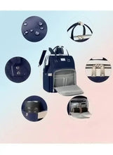 Navy baby travel backpack with multiple compartments, adjustable straps, side pockets