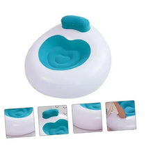 Inflatable lounge chair with teal back cushion and blue molded seat in white