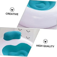 Inflatable lounge chair with teal seat insert and raised teal back cushion