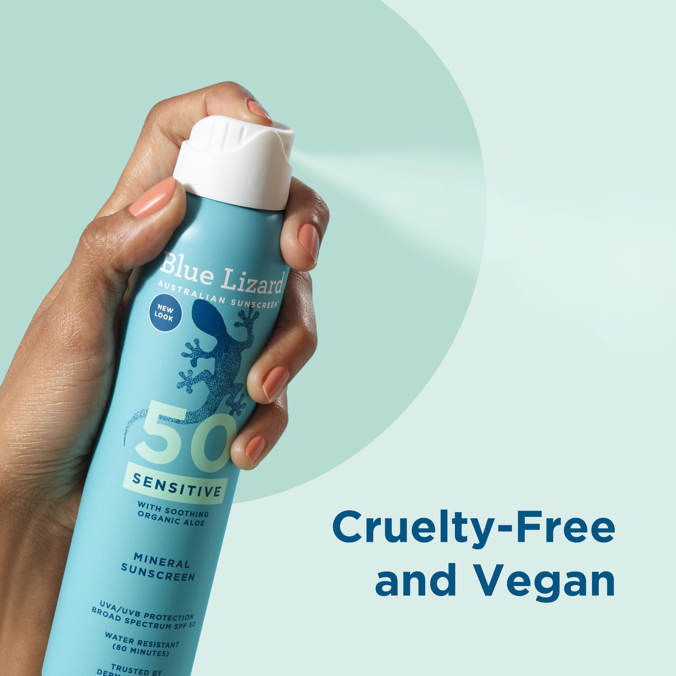 Hand spraying Blue Lizard mineral sunscreen spray SPF 50 with cruelty-free and vegan label