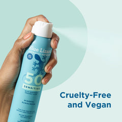 Hand spraying Blue Lizard mineral sunscreen spray SPF 50 with cruelty-free and vegan label