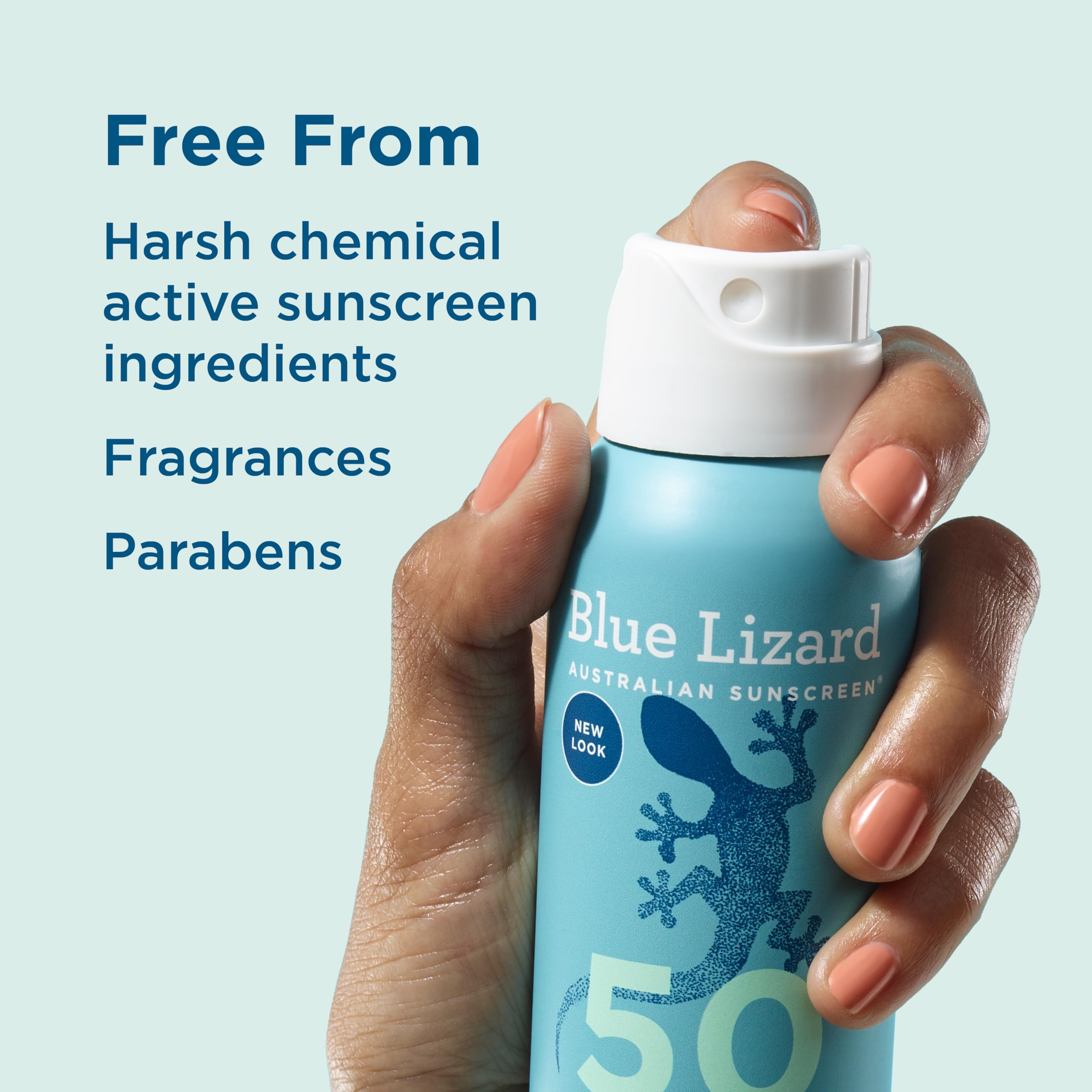 Hand holding Blue Lizard mineral sunscreen spray SPF 50 bottle with no harsh chemicals fragrances or parabens