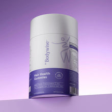Biotin hair health gummies bottle with white and purple label