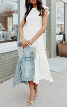 White sleeveless tiered midi dress with high neckline