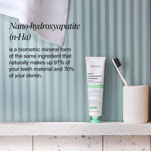 Boka nano-hydroxyapatite toothpaste tube with toothbrush and green cap