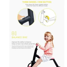 Kids balance bike frame with black handlebar and pink wheel rims