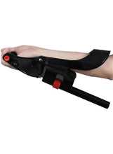 Adjustable wrist strength trainer with black strap, red knob, and extended handle
