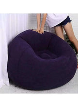 Purple inflatable lounge chair with open cup-style seat and curved back