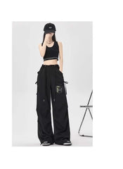 Huitich breathable flowy pants for women in black with wide legs and drawstring waist styling