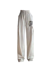 Huitich breathable flowy pants for women in light beige with elastic waist and side pockets