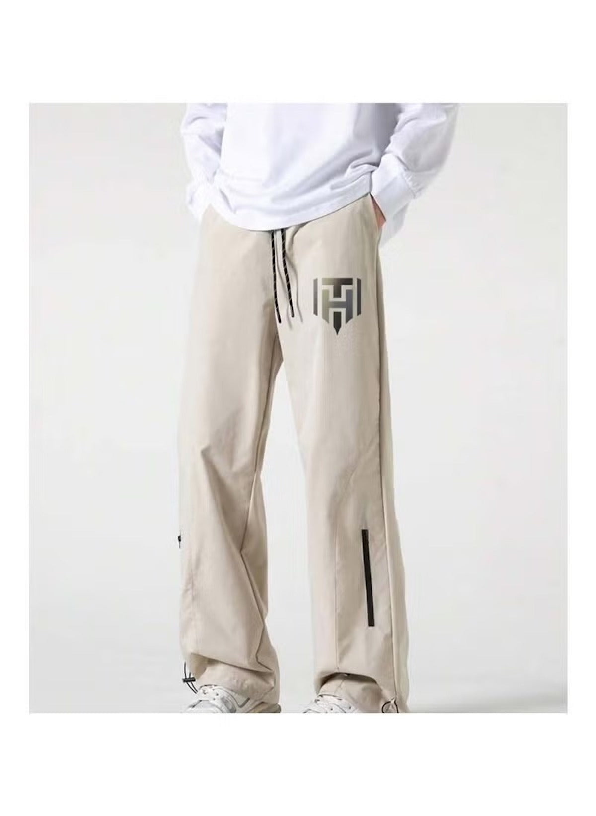 Huitich breathable outdoor pants for men in light beige with logo and adjustable drawstrings