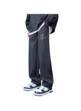 Men's dark outdoor pants, straight-leg with side zipper and adjustable cuffs