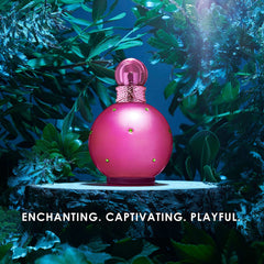 Pink round perfume bottle with decorative green accents, best floral fruity perfume for women