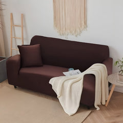 Huitich brown double seat sofa cover on a modern sofa with matching pillow and white throw blanket