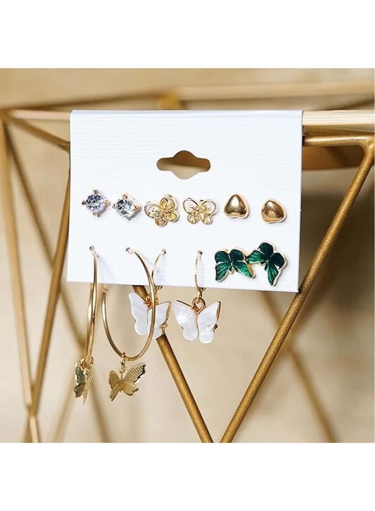 Butterfly and heart earring set for women featuring gold hoops and stud earrings