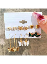 Earring set assortment on a card: hearts, butterflies, hoops, and stone studs