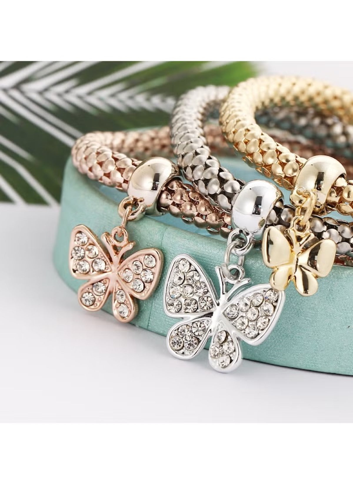 Huitich butterfly charm bracelet set featuring gold silver and rose gold bracelets with sparkling butterfly charms