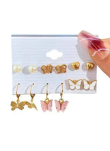 Earring set: gold butterfly, heart and pearl studs, with pink drop earrings