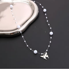 Huitich butterfly pearl necklace with white pearls and butterfly charm on a delicate chain