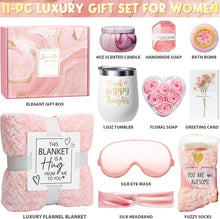 Self-care luxury gift set with flannel blanket, candle, soap, bath bomb, and eye mask