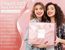 Self-care gift box held by two women, with pink themed packaging