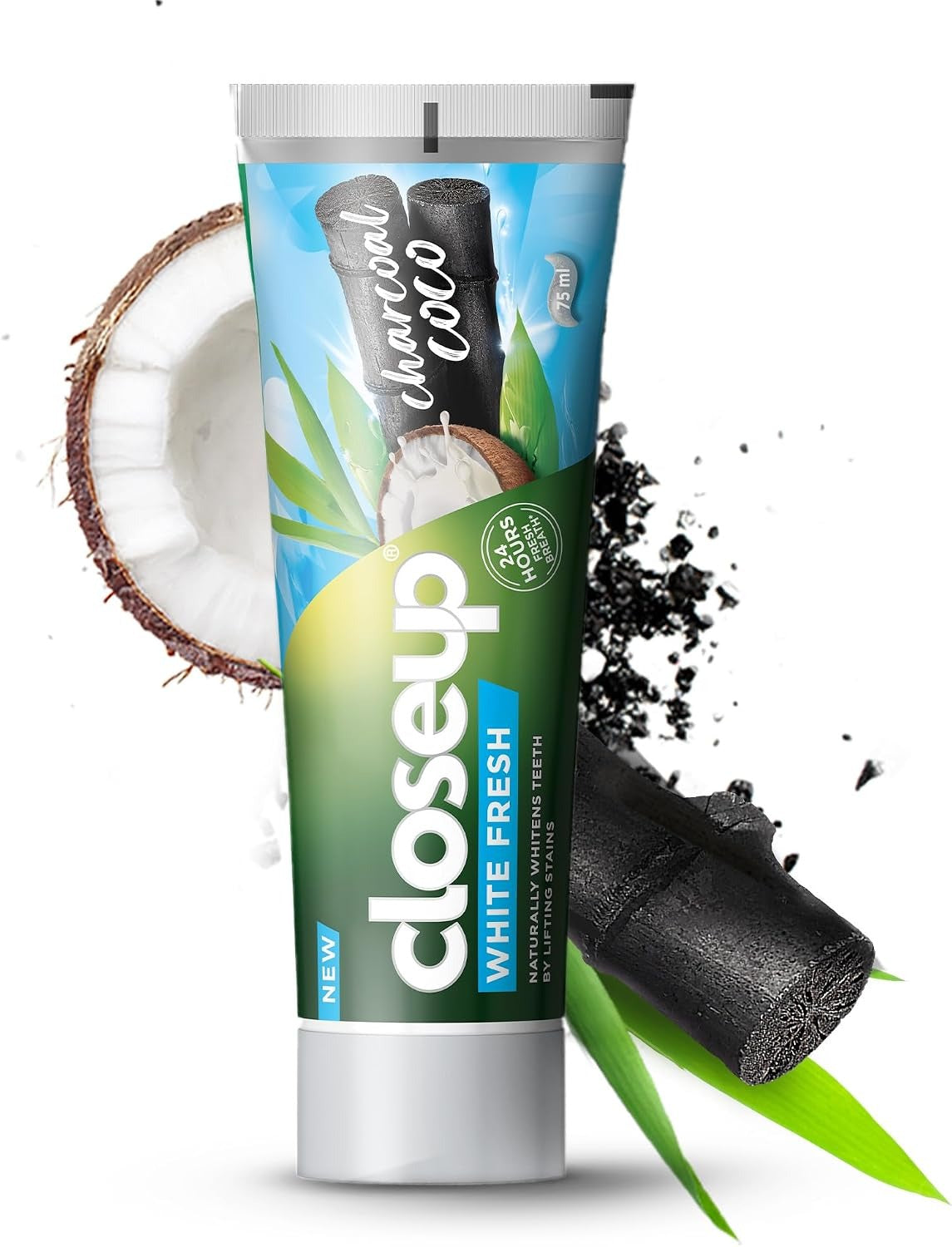 Toothpaste tube with white base, green-blue label, and charcoal pieces