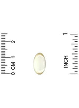 Vitamin D3 softgel, oval capsule, shown between rulers marked inch and cm