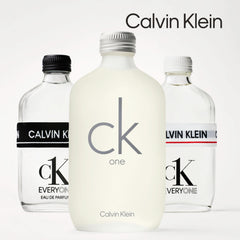CK One unisex Eau De Toilette 200ml frosted bottle in front of two clear Calvin Klein bottles