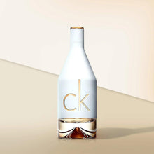 Eau de Toilette bottle front view with gold CK logo and gold liquid base